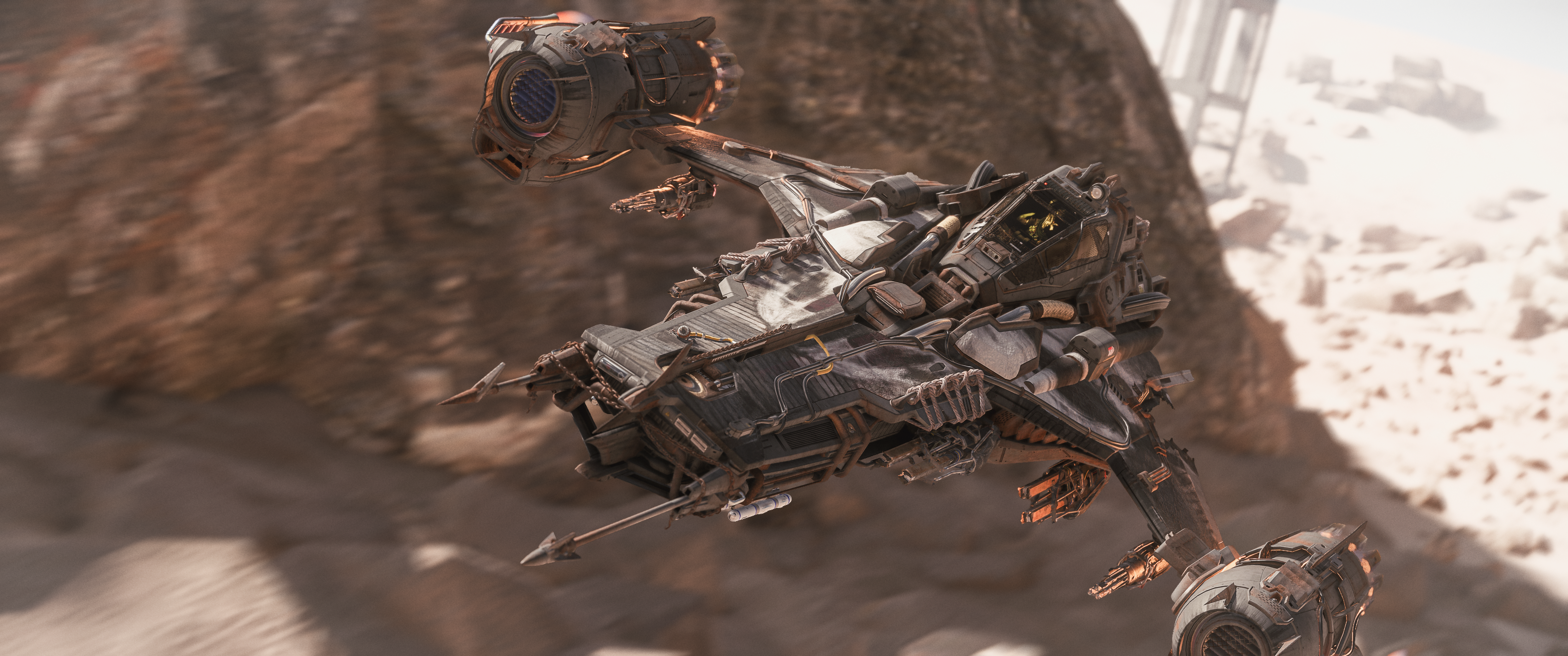 The new Grey's Market Basher flying low through a dusty desert landscape